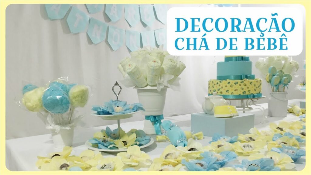 decoracao cha de bebe com bolo de fraldas e arco de baloes