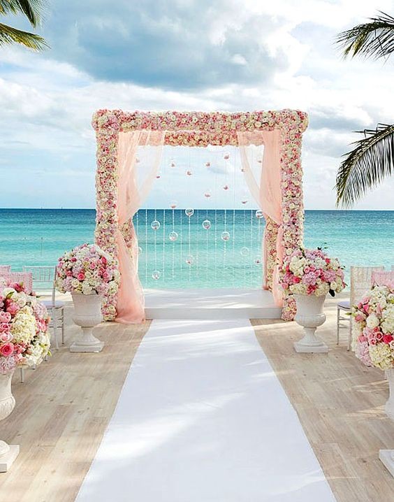 decoração boho chic para casamento na praia ao pôr do sol